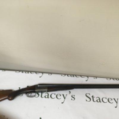An English 12bore double barrel sporting shot gun side by side barrels fixed choke double trigger ejector. Maker T Baker of London serial number 8471 PLEASE NOTE A SHOTGUN LICENCE IS REQUIRED TO BUY THIS LOT VIEWING AND COLLECTION IS BY APPOINTMENT ONLY.