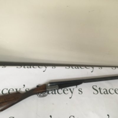 A Sporting Shotgun 12bore side by side maker Woodward & Son London ejector fixed choke double trigger serial number 63775. 27 inch barrel PLEASE NOTE A SHOTGUN LICENCE IS REQUIRED TO BUY THIS LOT VIEWING AND COLLECTION IS BY APPOINTMENT ONLY.