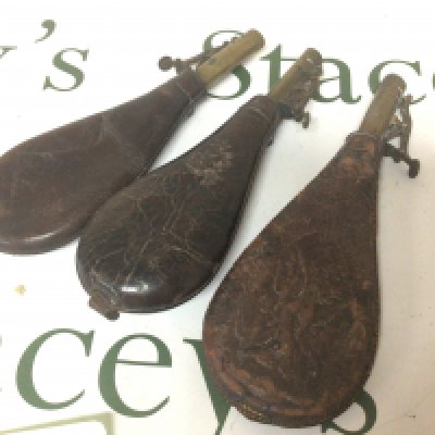 Three 19th century powder flasks with brass tops (3)