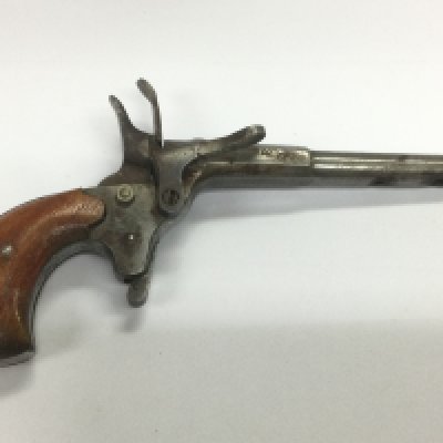 A small Belgian rim fire pistol. Shipping category D.