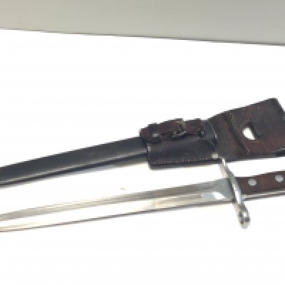 A Swiss Bayonet good example with a wood grip leather belt attachment maker Elsener Schwyz serial number 541069.