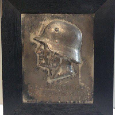A German Third Reich Honour Plaque with a side profile of a Soldier with the German inscription We Want to be free as the Father were. 37x43cm