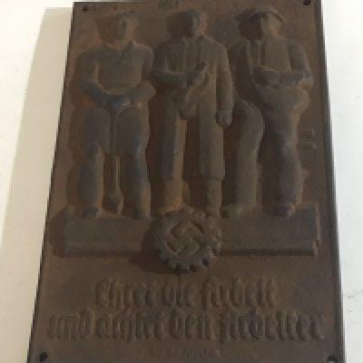 A Cast Iron plaque German Third workers party with inscription.
