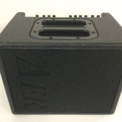 An AER Comoact 60 twin channel acoustic guitar amplifier with carry case.