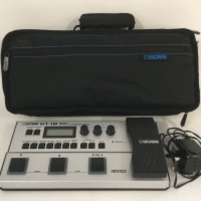 A Boss GT-18 bass effects processor pedal wit original case and power lead.
