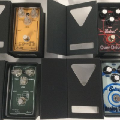 Four Belcat guitar effects pedals.