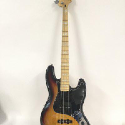 A Fender Squier jazz bass guitar. Comes with a soft carry case.