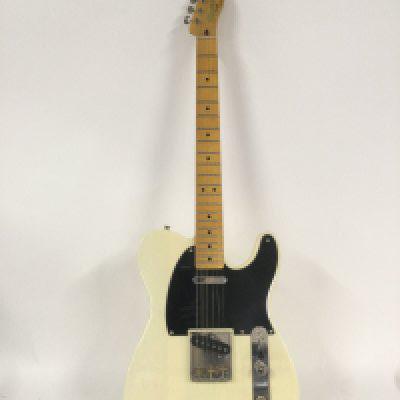 A Fender Squier Telecaster in a cream finish with a black pickguard. Comes with a soft carry case.