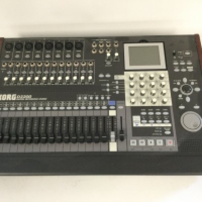 A boxed Korg D3200 digital recording studio.