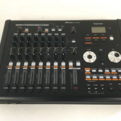 A boxed Tascam DP-02CF digital portastudio.