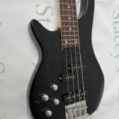 A Gear for Music Left Handed Bass Guitar in Black with chrome parts. Overall condition very good used. Comes with practice amp.