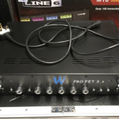 A boxed Warwick Pro Fet 3 bass amp head.