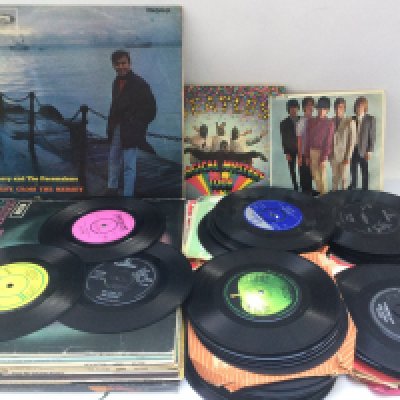 A bag of LPs, EPs and 7" singles by various artists including The Rolling Stones, Deep Purple, Eddie Cochran and others. Please note Magical Mystery Tour EP is missing one disc.
