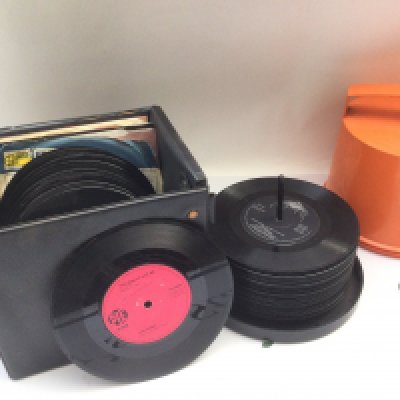 Two record cases of 7" singles by various artists from the 1960s onwards.