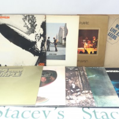 Nine rock LPs by various artists including Led Zeppelin, The Who, Deep Purple and others.