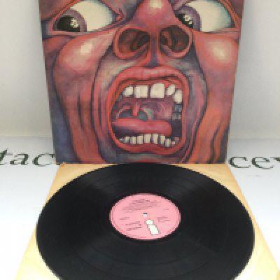 A first pressing of 'In The Court Of The Crimson King' by King Crimson. Two small feelable scratches on side one.