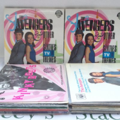 A collection of The Avengers and other TV theme related LPs and 7" singles including some demonstration discs plus a laser disc of The Avengers.