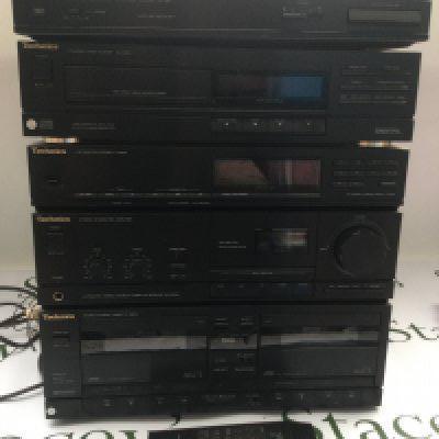 A Technics stacking hi fi system comprising an SL-J90 turntable, SA-X900L amplifier and others. Comes with remote control.