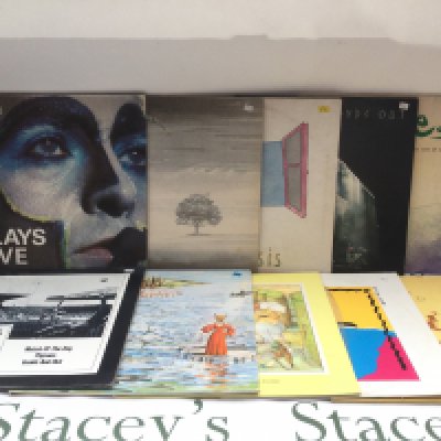 Ten Genesis LPs and 12" singles comprising 'A Trick Of The Tail', 'Foxtrot', 'Selling England By The Pound' and others.