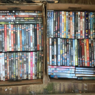 Two boxes of CDs and DVDs.