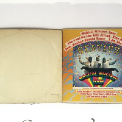 Two Beatles LPs comprising a numbered 'White Album' 0125304 and a US pressing of 'Magical Mystery Tour'. Both discs of the 'White Album' are sadly scratched and is lacking poster.