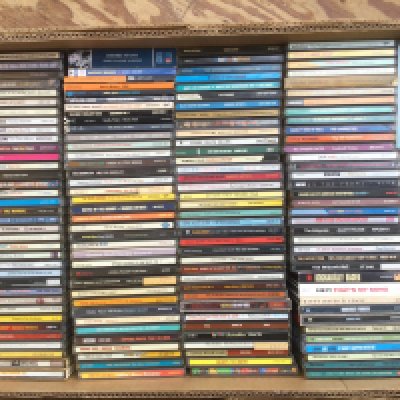 A box of jazz, blues and rockabilly CDs.