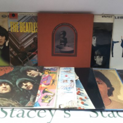 Eleven Beatles and solo LPs comprising 'Please Please Me', 'McCartney', 'The Concert For Bangladesh' and others. Please note all Beatles LPs in this lot are on the later black and silver labels.
