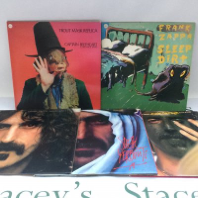 Four Frank Zappa LPs comprising 'Apostrophe', 'Sheik Yerbouti' and two others plus 'Trout Mask Replica' by Captain Beefheart (5). Includes two promo copies.