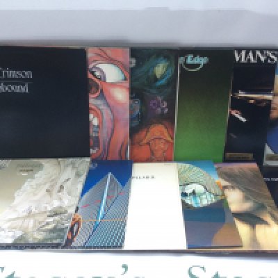 Twelve prog rock LPs by various artists including King Crimson, Yes, ELP and Rick Wakeman.