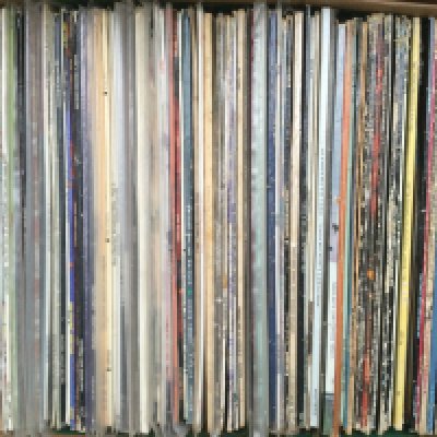 Four boxes of LPs and 12" singles by various artists including Otis Redding, Bob Marley, Queen and many more.