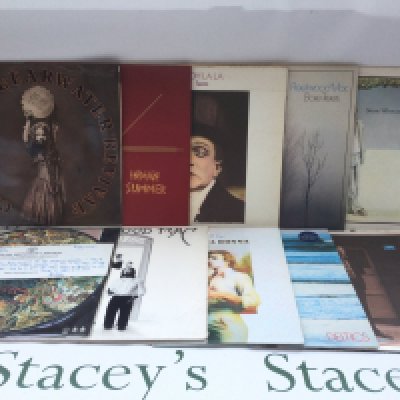 Two bags containing 21 rock and pop LPs by various artists including Fleetwood Mac, Elton John, Slade and others.