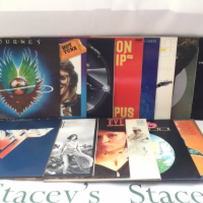Fifteen rock LPs by various artists including Steely Dan, Van Halen, Cheap Trick, Jefferson Starship and others. Includes four promo LPs.