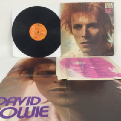 A signed first UK pressing of the David Bowie 'Space Oddity' re release LP from 1972, RCA LSP 4813. Signed by Bowie to the front and rear of the sleeve plus the poster, centre label and inner sleeve. Comes with a letter of provenance.
