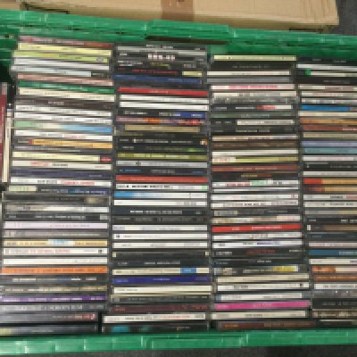 Eight boxes of CDs by various artists. Includes promotional discs.
