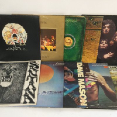 Two bags containing 20 rock LPs by various LPs including Deep Purple, Queen, Rainbow, Free and others.