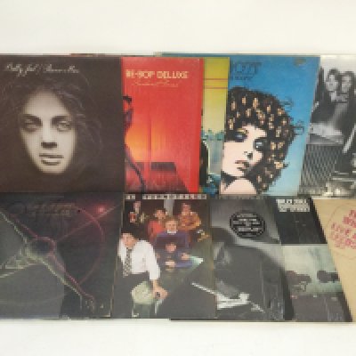 Two bags containing 20 rock and pop LPs by various artists including The Who, Mott The Hoople, Billy Joel and others.