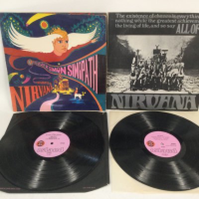 Two early UK pressings of Nirvana (UK) LPs comprising 'All If Us' and 'The Story Of Simon Simopath'. Vinyl Ex.