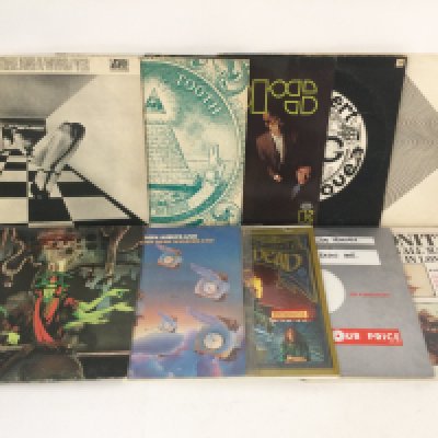 Two bags containing 20 psychedelic rock and ambient LPs by various artists including The Doors, The Grateful Dead, Gong, Spooky Tooth and others.