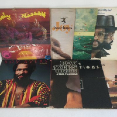 Two bags containing 25 funk and soul LPs and 12" singles by various artists including Isaac Hayes, James Brown, Roy Ayers and others.