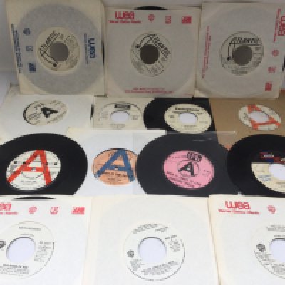 Seventeen promo discs by various artists including The Rolling Stones, The Kinks, Genesis and others.