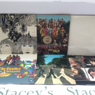 Six Beatles LPs comprising reissues and earlier pressings including a 1970s side loading numbered 'White Album', 'Abbey Road', 'Yellow Submarine' and others.