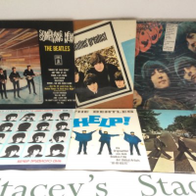A record case of Beatles LPs comprising some foreign pressings including a Japanese red vinyl 'Abbey Road', a Russian 'A Hard Day's Night' and others.