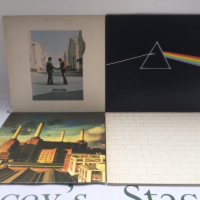 Four Pink Floyd LPs comprising 'Dark Side Of The Moon', ''Animals', 'Wish You Were Here' and 'The Wall'.