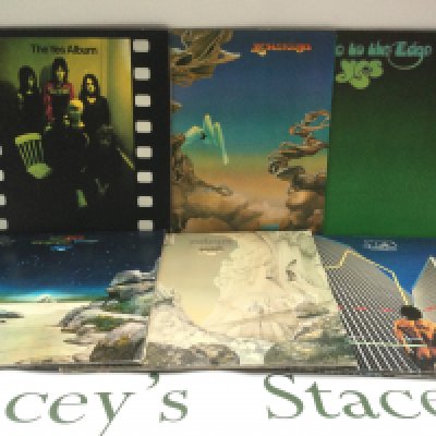 Thirteen Yes and Rick Wakeman LPs comprising 'The Yes Album', 'Tales From Topographic Oceans', 'No Earthly Connection' and others.
