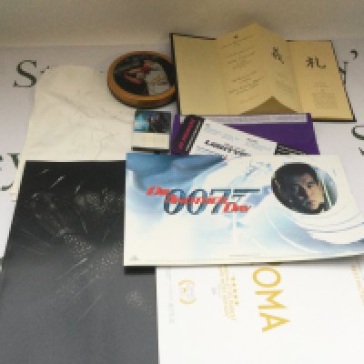 A collection of film ephemera comprising various special screening tickets, a signed publicity print of Susan Hampshire, a napkin signed by Suzi Quattro etc.
