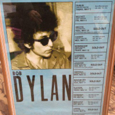A framed and glazed reproduction Bob Dylan tour poster, approx 49cm x 68cm excluding frame.