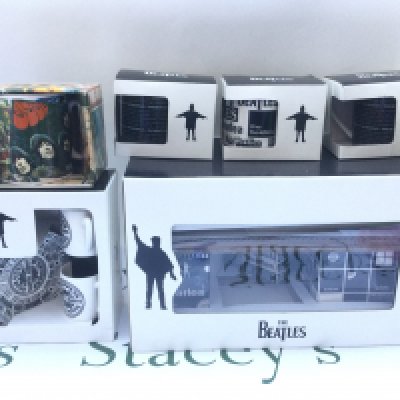 A collection of boxed Coalport Beatles related ceramics.