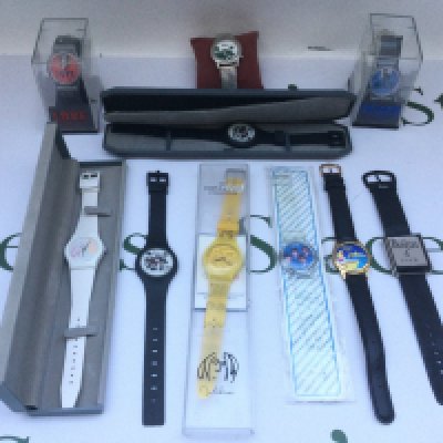 A large collection of Beatles watches.