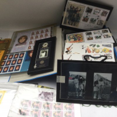 A binder of Beatles related stamps and first day covers.