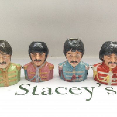 A set of Ray Noble limited edition Beatles character jugs, approx height 14cm.